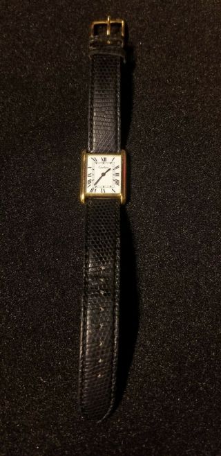 Cartier Tank Louis W1529856 Womens 18k Gold Black Leather Strap Wristwatch.