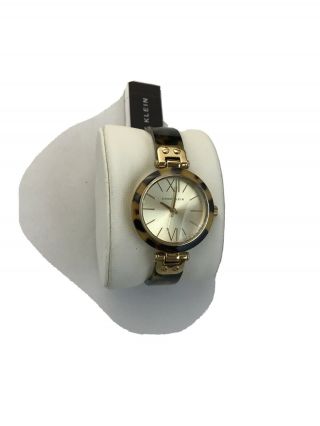 Anne Klein Womens Quartz Watch (y121e) Mineral Crystal/gold Tone/ Tortoise