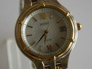 Seiko Sut020 Solar V187 - 0aa0 Two - Tone Stainless Steel Ladies Watch