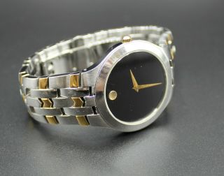 Movado Dress Watch With Black And Gold Face 81 G2 1850 Mens Wristwatch
