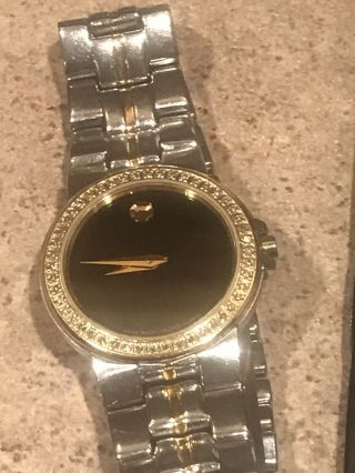 Ladies Two Tone Movado Watch With A Diamond Bezel In