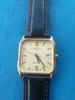 MENS VINTAGE ROTARY SWISS QUARTZ DATE WATCH.  BOX AND PAPERS 2