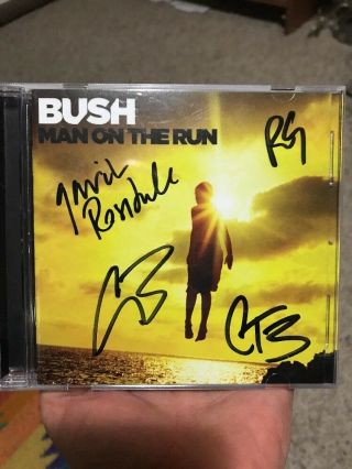 Bush Group Band Signed Autographed " Man On The Run " Cd Booklet Look