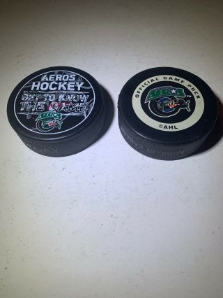 (2) Vintage Houston Aeros Ahl Inglasco Official Game Puck Hockey Made In Canada