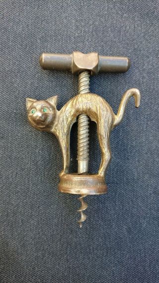 Antique bronze figural cat corkscrew with glass/jewel eyes made in Germany 2