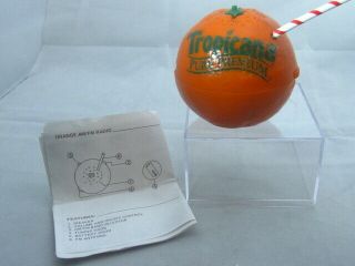 - Vintage Tropicana Orange Am/fm Transistor Radio,  Orig Box And Papers