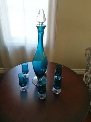 Set Of Six Teal Shot Glasses With Clear Base Tulip Shaped And Matching Decanter.