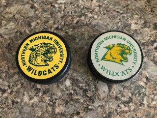 Northern Michigan University Hockey Pucks (2)