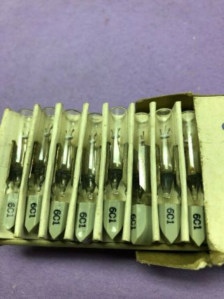 100 GENERAL ELECTRIC 6C1 miniature lamps (for old pop up button telephones?) 3