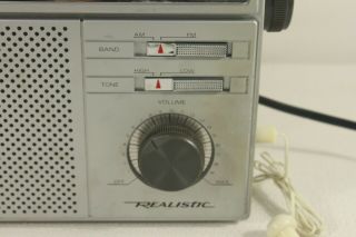 REALISTIC 12 - 717 AM/FM portable radio.  (ref C 977) 2