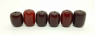 58.  9 Grams Six Big Beads Antique Faturan Cherry Amber Bakelite Marbled/veins.