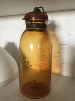 Antique Yellow Half Gallon Globe Fruit Jar With Lid & Clamp