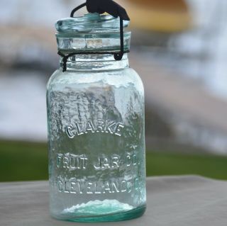 Antique CLARKE FRUIT JAR CO.  aqua quart,  nicely whittled,  glass lid,  cam lever 2