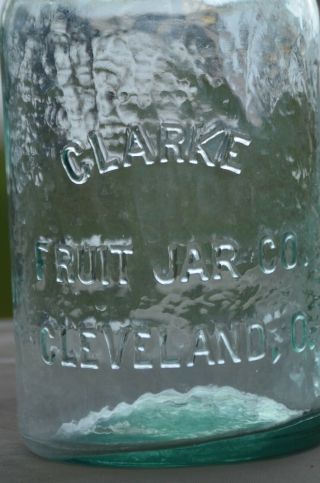 Antique CLARKE FRUIT JAR CO.  aqua quart,  nicely whittled,  glass lid,  cam lever 3