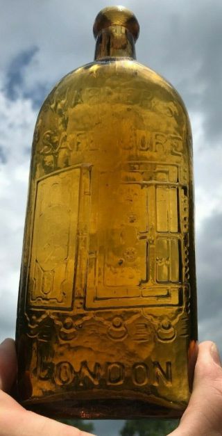 Warner’s Safe Cure London England Light Yellow Amber Medicine Bottle