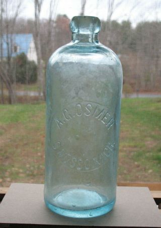 Large Owosso,  Mich.  Hutchinson Soda Bottle A.  G.  Osmer