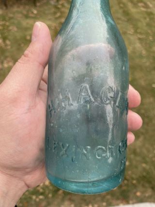 Early H.  Hagen Embossed Aqua Blob Top Soda Bottle Lexington Mo Missouri