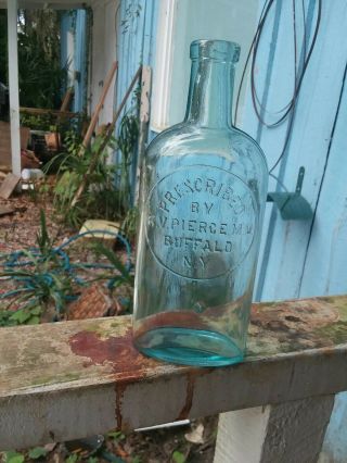 Antique Medicine Bottle Embossed " Prescribed By R.  V.  Pierce M.  D.  Buffalo N.  Y.  "