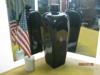 Shipwreck 10 1/4 " Pontiled Black Glass Taper Lip Dutch Case Gin