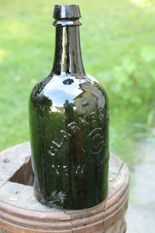 Clarke & White Mineral water bottle.  Dark green glass,  open bubbles & defects 2