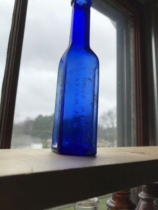 Laxol A J White.  York Embossed Glass Bottle Cobalt Blue - Patented 1894 3
