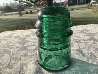 Green A.  T.  & T.  Co.  Cd - 121 Glass Insulator.  Tough To Find Color