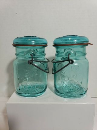 Two Vintage Aqua Blue Ball Ideal Bicentennial Mason Jars Bale Wire Lids