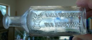 Vintage Eagle Drug Store Red Jacket Michigan Medicine Bottle W/ Eagle
