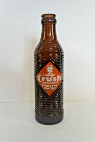 Orange Crush 7 Oz Bottle Ribbed Crushy Character Amber Dated 1949 Advertisement