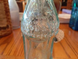 Soda Water prop of Coca Cola.  Atlanta Ga.  Blue bottle.  6 fl oz 2