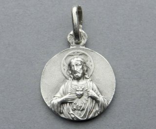 Jesus Christ,  Saint Virgin Mary.  Sacred Heart.  Antique Religious Silver Pendant.