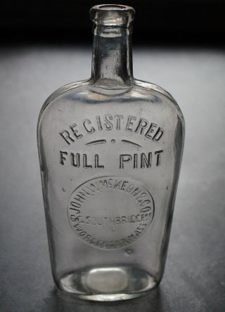 Antique Strap Sided Pint Whiskey Flask - John W.  Mckeon & Co Worcester Mass.