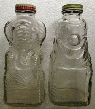 Vintage Glass Elephant And Clown Grapette Beverage Syrup Bottles Bank 1950s
