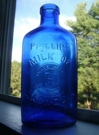 Antique Deep Cobalt Blue Embossed Medicine Cure Bottle