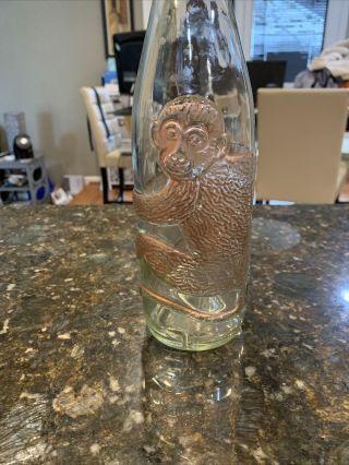Germany Vintage 12.  5 " Tall Clear Glass Bottle With Embossed Monkey