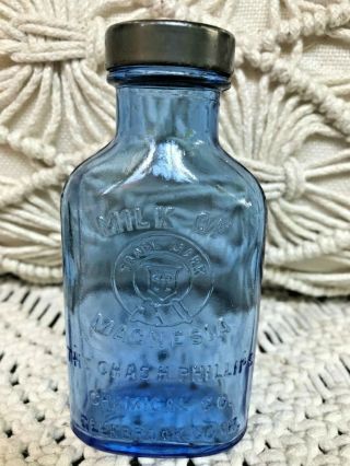 Vintage Advertising Phillips Milk Of Magnesia Embossed Blue Glass Bottle