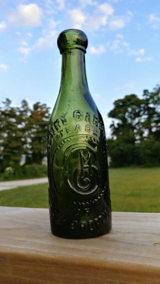 Antique Olive Green Henry Gardner West Bromwich,  England Embossed Beer Bottle