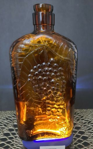 Antique Copenhagen Amber Glass Bottle / Flask Embossed With Rised Grapes And Vin