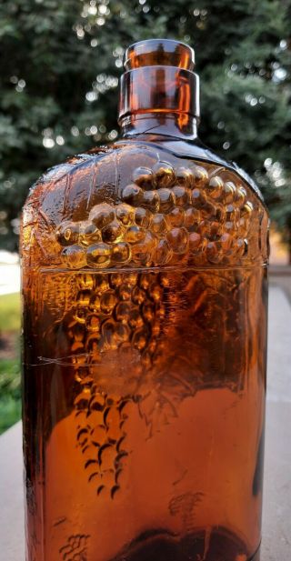 ANTIQUE COPENHAGEN AMBER GLASS BOTTLE / FLASK EMBOSSED WITH RISED GRAPES AND VIN 3