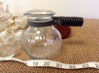 Vintage Glass; stoppered bottles,  vintage pot,  amber glass with sunshine lid. 2