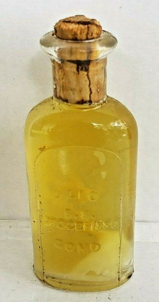 Vintage,  Clear Glass Bottle Of " Crucifix Oil " (religious Oil).  " S.  S.  Crocefisso