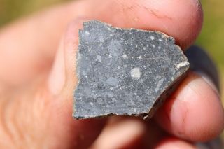 Lunar Meteorite NWA 11474 Meteorite end cut 3.  3 grams 2