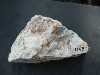 Axinite (non - Fl. ) With Native Lead And Willemite,  Franklin,  Nj