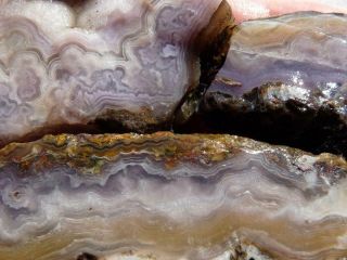 Rimrock: 13.  6 Oz Royal Purple Aztec Lace Agate Rough