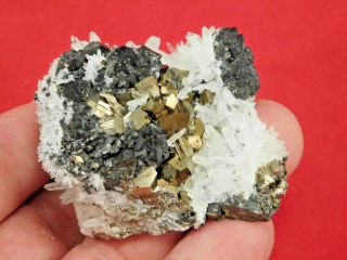 A Quartz Crystal Cluster With Pyrite Crystals And Galena Crystals Peru 131gr