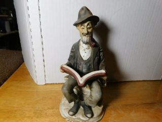 Decor.  Figurine Old Man Sitting On Bench Smoking His Pipe Reading Book Vtg.