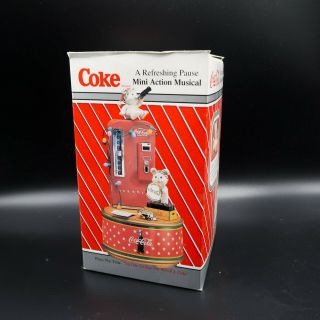 1995 Enesco Coca Cola Mini Action Musical Box Plays ".  Buy The World A Coke "