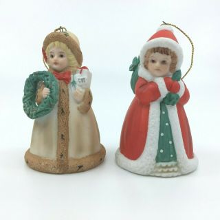 Enesco 1991 Marjarie Sarnat Christmas Girl Bell Ornaments Set Of 2