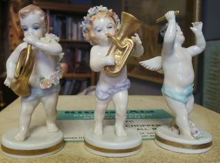 3 - Old Irish Dresden Porcelain Cupid Putti Band Figurines Horns Signed Look