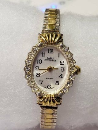 Sarah Coventry Ladies Gold Tone Stretch Band Watch W Battery